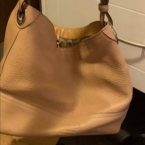 Tan Coach purse